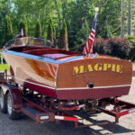 Antique boat on trailer